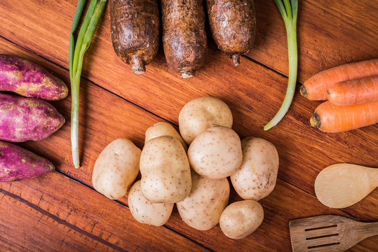 Vegetables over wooden table