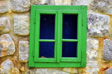 Fototapeta na wymiar Old window. Wooden window and stone wall background