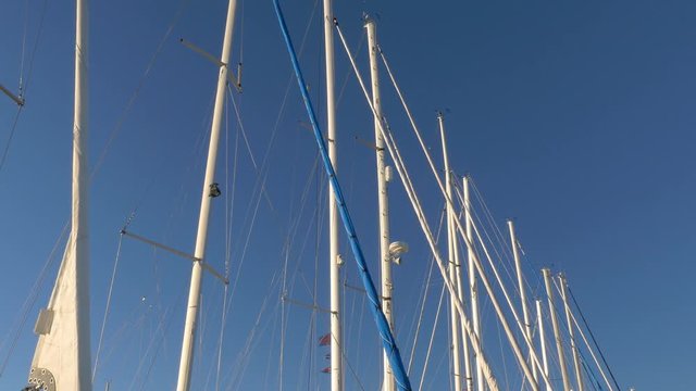 Sailboat harbor sunset - Sailing, sail, ship, boat in marina. Baltic Sea. Clip contains port, harbor, dock, seaport, dawn, sunset	
