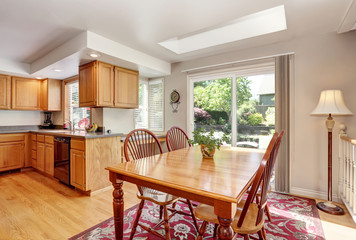 Kitchen room interior with with granite counter top and island.