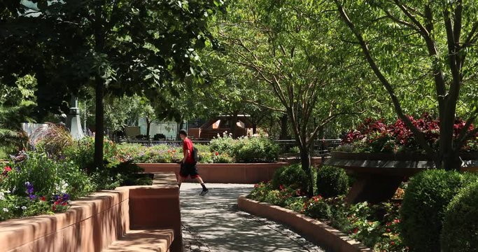LDS Church Temple Square couple garden park sidewalks Utah. The Church of Jesus Christ of Latter-day Saints, LDS or Mormon Church. Headquarters of the international Christian religion.
