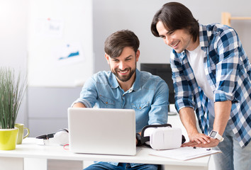 Joyful colleagues working together