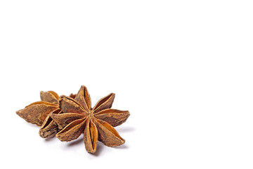 Fototapeta premium anise stars on a white background