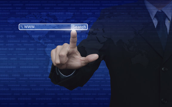 Businessman hand pressing search www button over digital world m