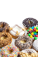 Delicious donuts with icing isolated on white