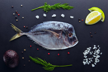 Fresh fish (Vomer or Selene setapinnis ) sea salt, dill,dark purple avocado