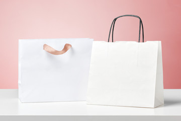 few different shopping bags on the desk