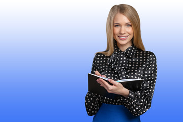 friendly young smiling businesswoman with clipboard and pen