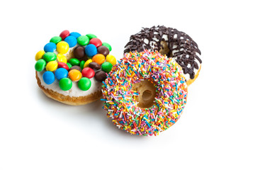 various donuts on white background