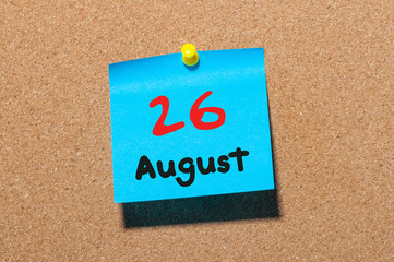 August 26th. Day 26 of month, color sticker calendar on notice board. Summer time. Empty space for text