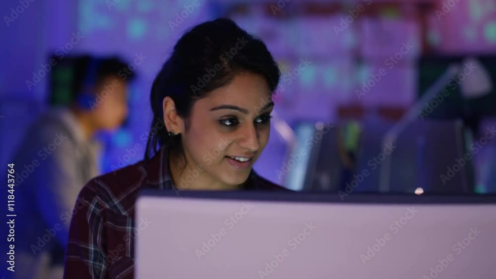 Wall mural young computer hacker trying to gain access to a computer system