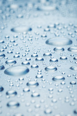 drops of water on a light surface