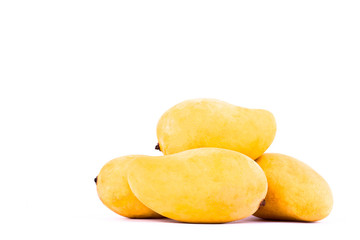 a pile yellow sweet ripe mangos on white background healthy fruit food isolated
