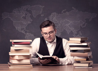 Geography teacher at desk