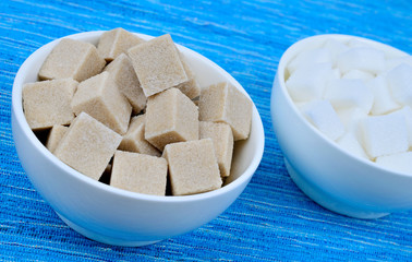 Sugar cubes in bowls