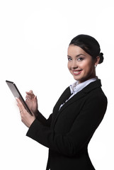 beautiful girl in a black business suit with tab standing on a w