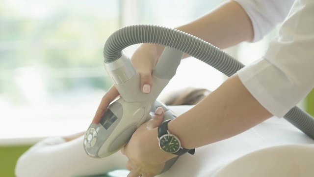 LPG massage in the beauty center. Anti-cellulite massage.