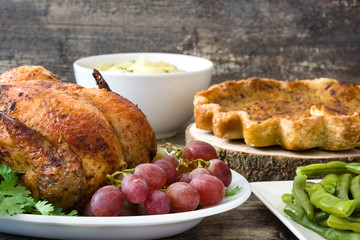 Thanksgiving dinner on rustic wooden background

