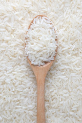 Jasmine rice and wooden spoon