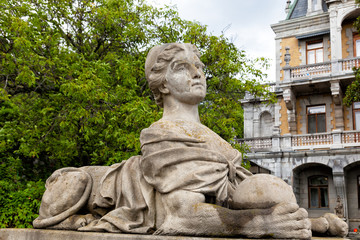 Fototapeta na wymiar Crimea. Ancient sculpture of a woman-sphinx in the palace park in Massandra