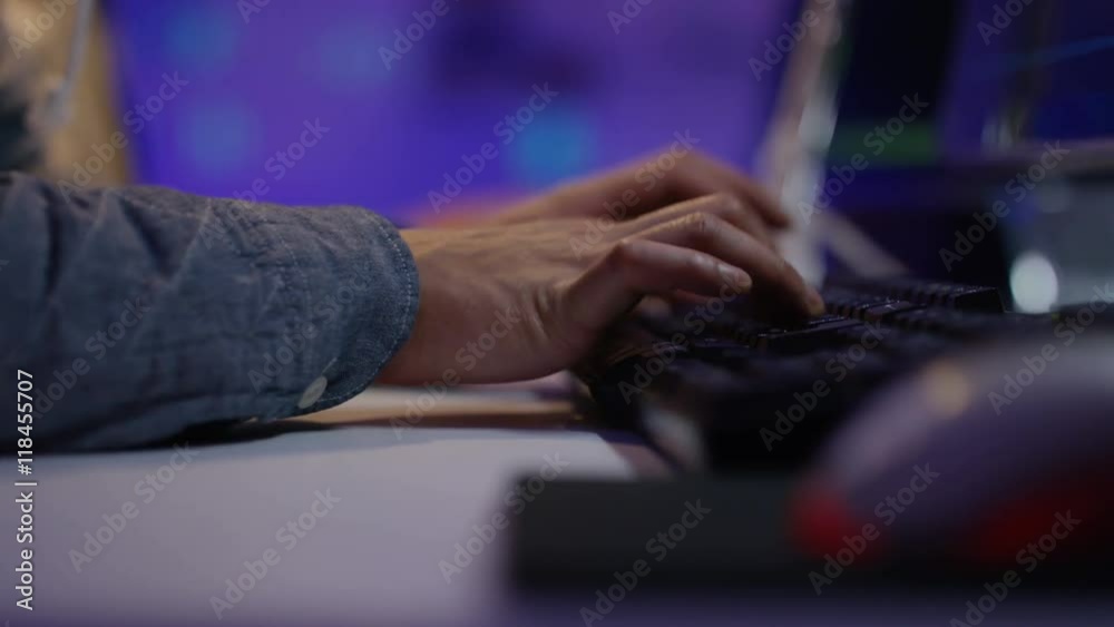 Wall mural close up on hands of unrecognizable person working on computer