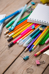 Fototapeta premium Pencils and pens student with a notebook