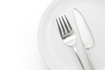 plate with fork and knife isolated