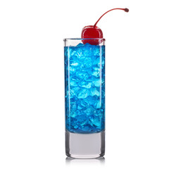 Blue curacao cocktail shot with cherry isolated on white background.