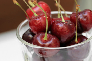 Close up of red cherry in glass.