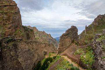 Fototapeta na wymiar Walking path in the rocky mountains of Madeira island.