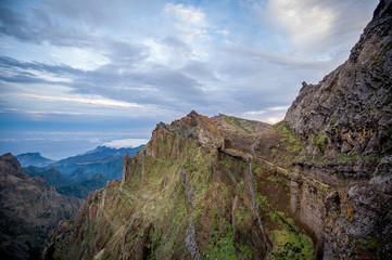 Fototapeta na wymiar Evening light and hiking path on the edge of rocky cliff