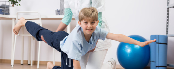 Little boy exercising