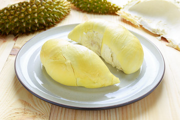 Peice of durian on the circle plate in dark tone