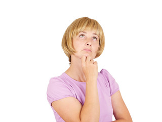 Young woman thinking looking up