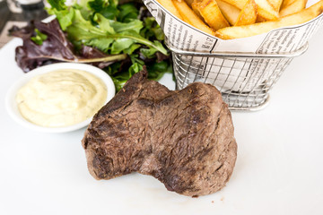 juicy steak beef meat with tomato and french fries