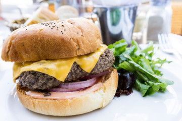 Cheese burger - American cheese burger with fresh salad