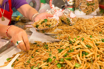Selling Bamboo worm fried food