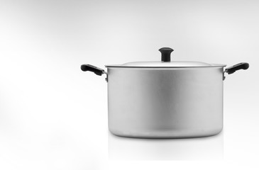 a kitchen pan on a light background, one