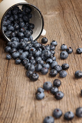 Bilberry in white enameled mug