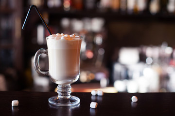 Chocolate shake with marshmallows  at bar counter, close Up