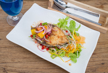 Fillet topped with a spicy dressing.