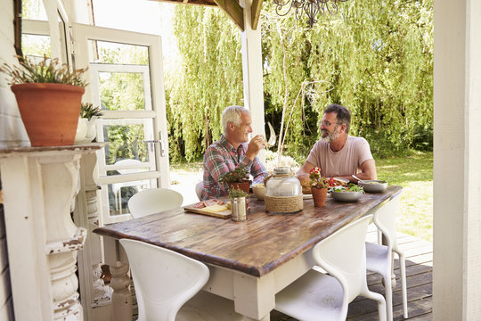 Couple having lunch on patio
