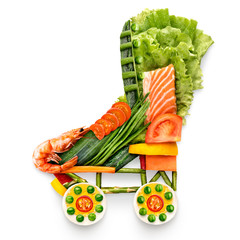Skating and health / Healthy food concept of quad roller skates made of fresh vegetables and fruits full of vitamins, isolated on white.