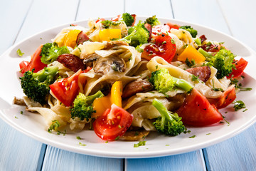 Pasta with sausages and vegetables