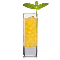 Yellow cocktail in tall glass isolated on white background.
