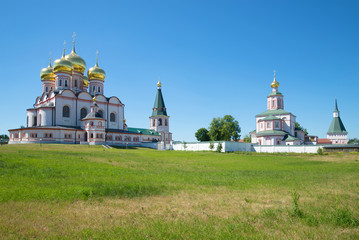Fototapeta na wymiar The complex of buildings of the Valday Iversky Svyatoozersky monastery a sunny day in july. Novgorod region, Russia