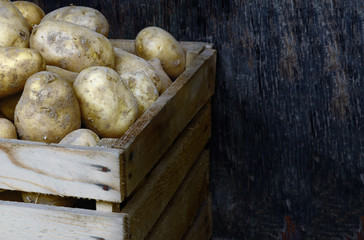 potatoes in a wooden box