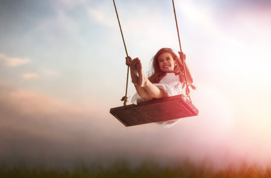 child girl on swing