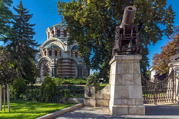 Fototapeta na wymiar Cannon from the Russo-Turkish War of 1877-1878 and St. George the Conqueror Chapel Mausoleum, City of Pleven, Bulgaria