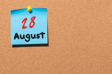 August 28th. Day 28 of month, color sticker calendar on notice board. Summer time. Empty space for text